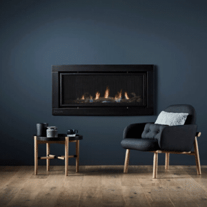Wall fitted fire place with two easy chairs