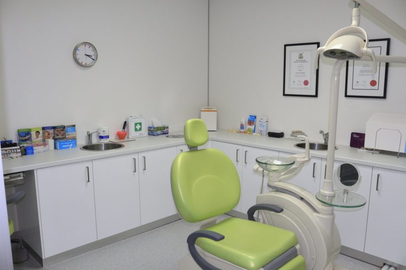 Green dentist chair in Fitzroy