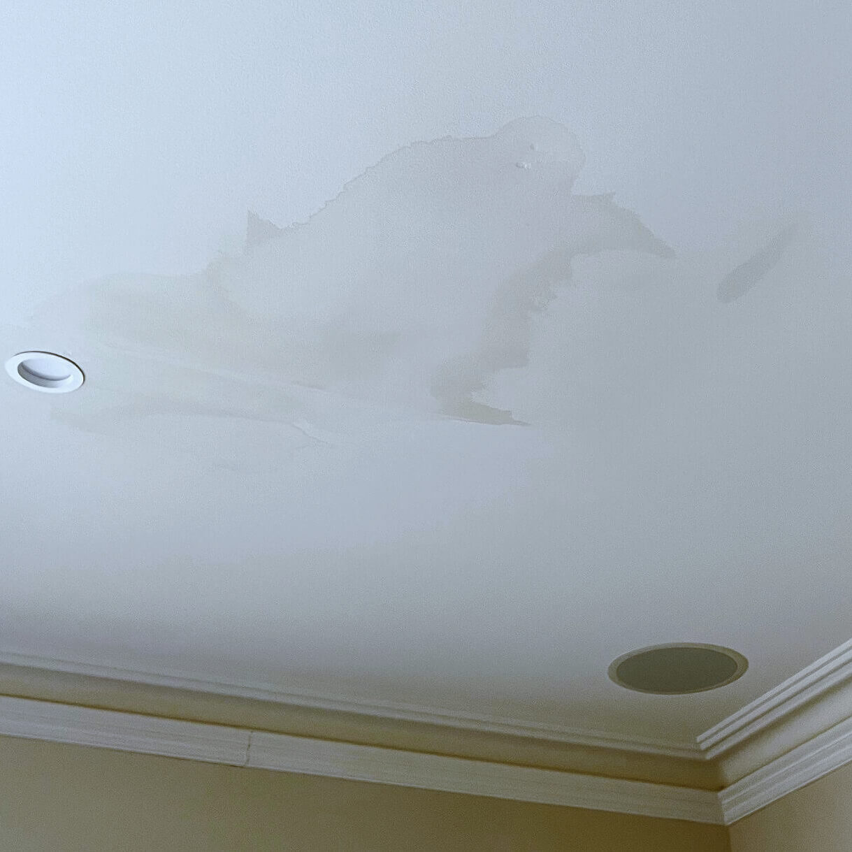 Stained ceiling from leaking water