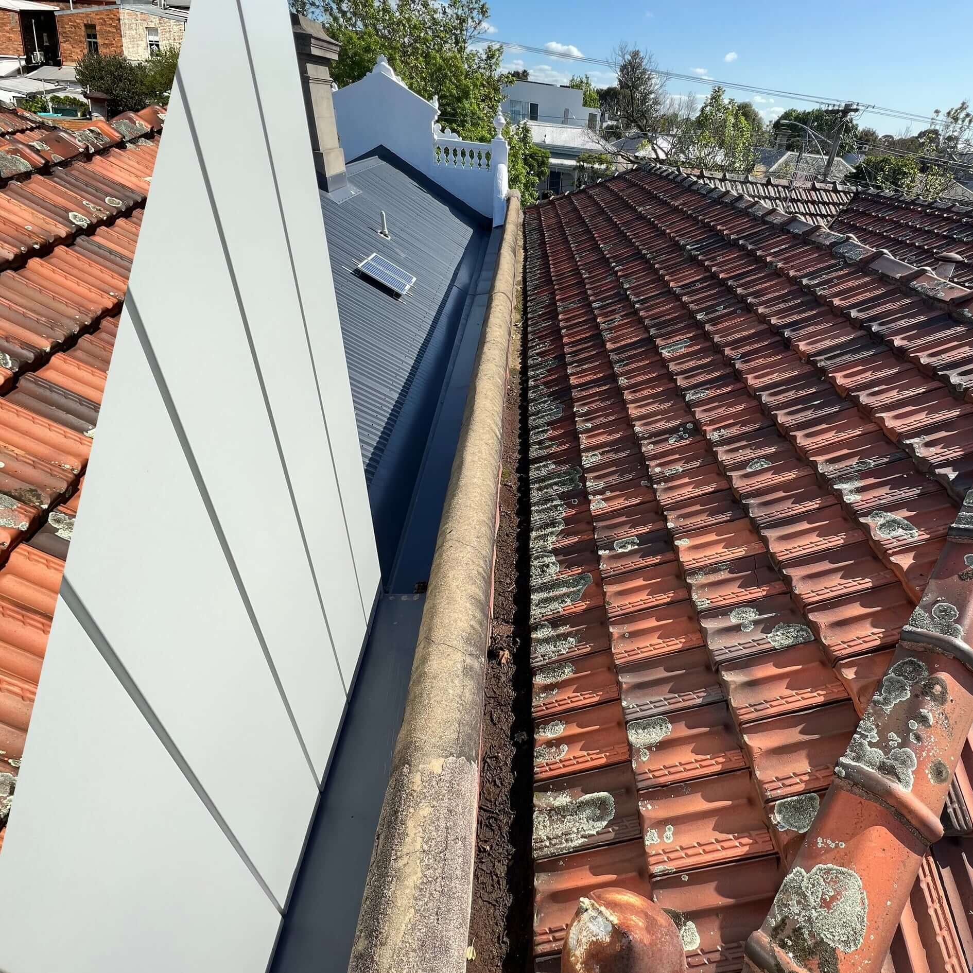 Roof leak terrcoate tiles new drains blend